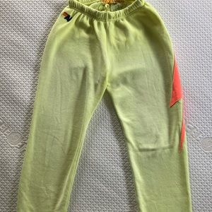 Aviation Nation faded neon yellow pants